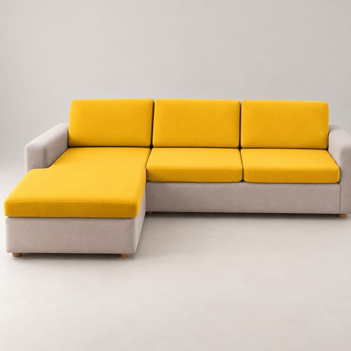 Yellow smooth stretch covers on the seat and back cushions of a beige sectional sofa
