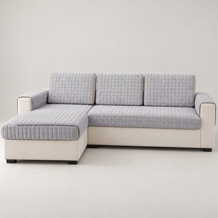 Light gray velvet flannel couch covers on the seats of a white L-shaped sofa