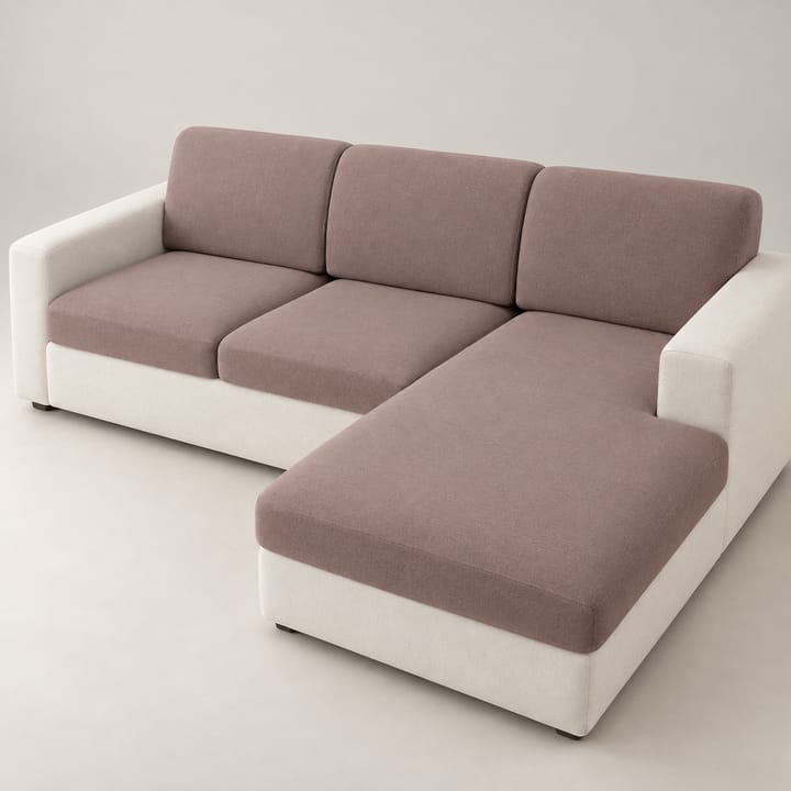 Taupe milk silk covers on the seat and back cushions of a sectional sofa