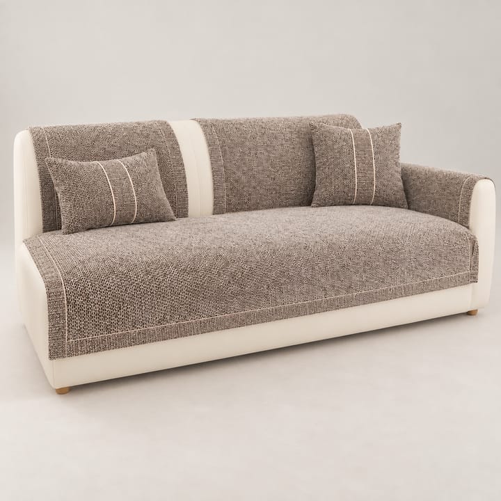 Taupe tweed chenille couch cover on the seat of a sofa with cushions